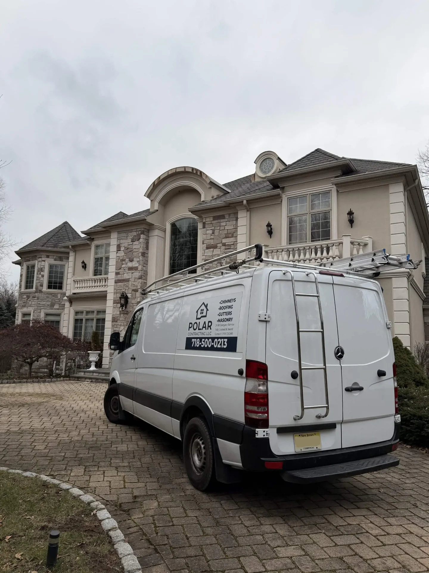 Polar Contracting work van outside a North Jersey home